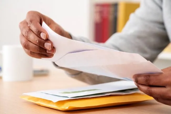 Person receiving IRS CP79 Notice in the mail