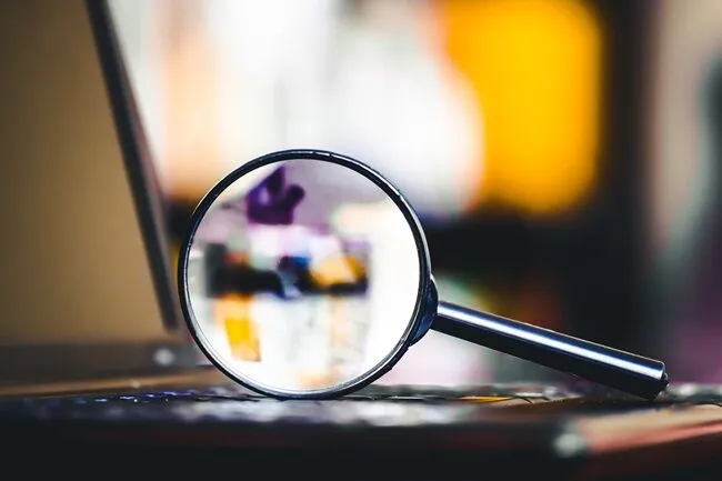 Magnifying glass looking closer at SCE documentation
