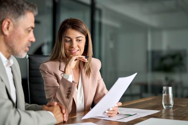 Tax attorney works with client to reduce tax debt and stop collection actions