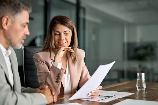 Tax attorney works with client to reduce tax debt and stop collection actions