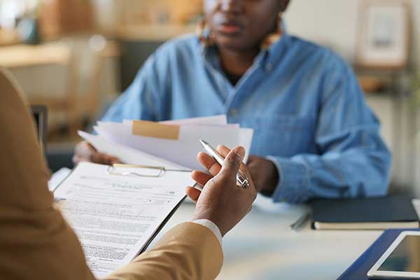 Woman meets with Georgia Sales Tax Audit lawyer