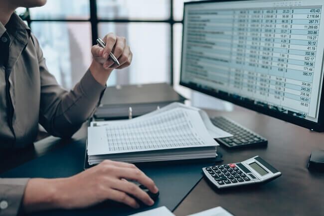 Business owner reviewing accounts