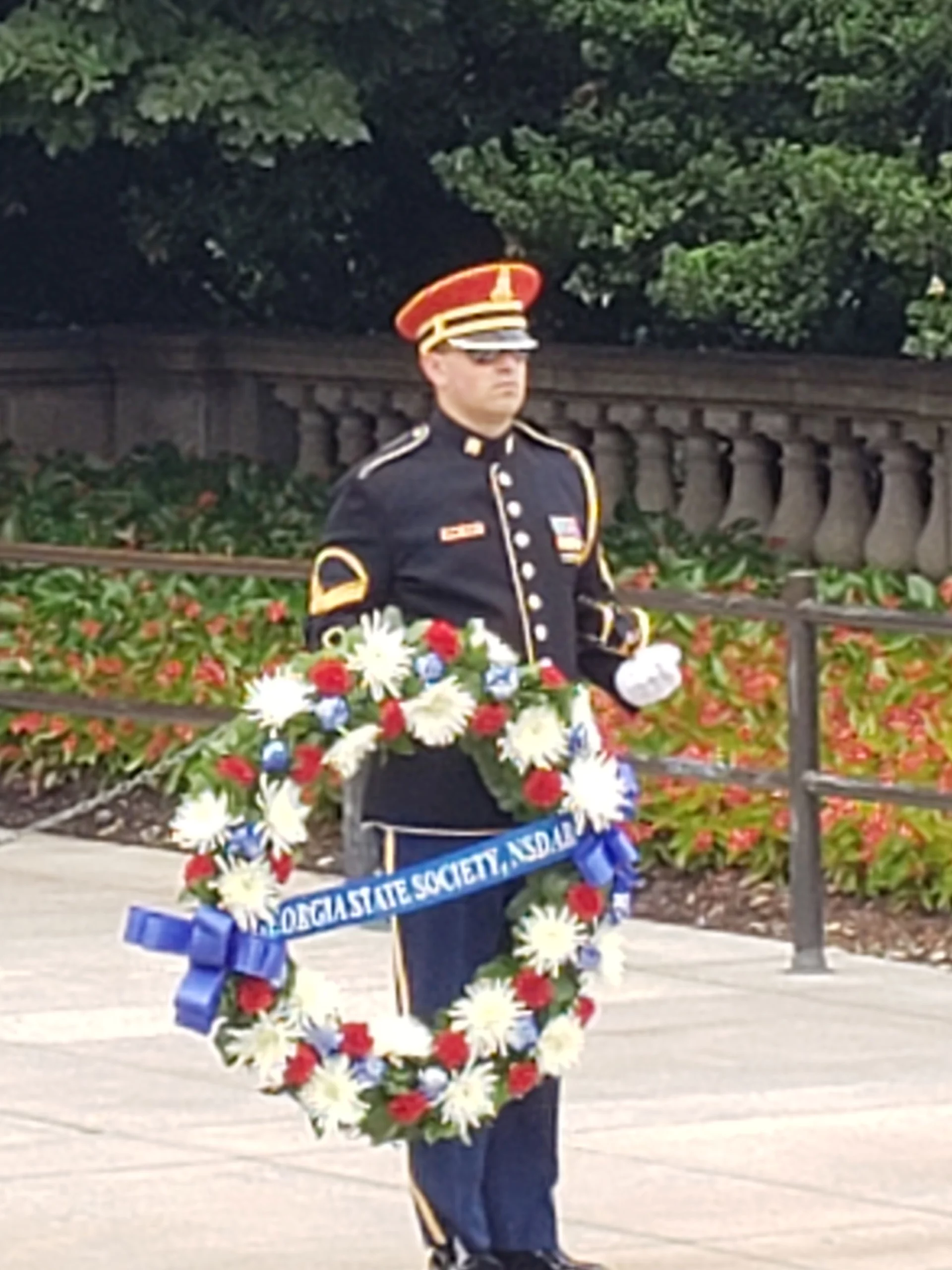 Solider performs laying of a memorial wreath