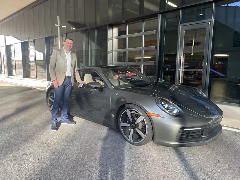 Georgia tax attorney Jason Wiggam with a Porsche