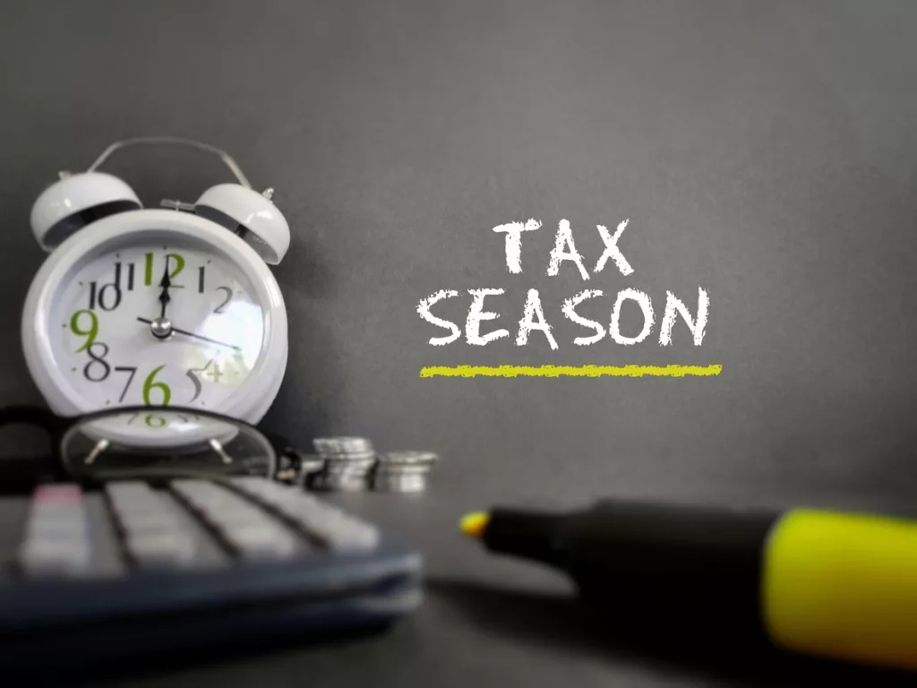 Tax season text in vintage background.