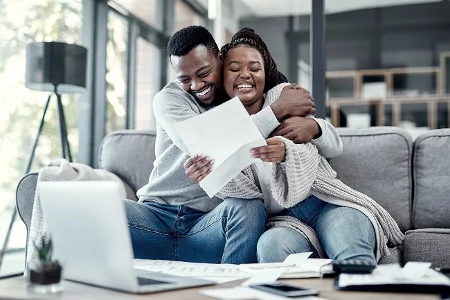 Couple celebrates getting out of tax debt
