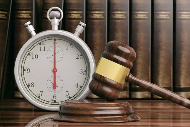 Stopwatch and gavel in IRS tax lawyer office