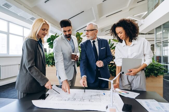 Investors reviewing an opportunity zone for tax benefits