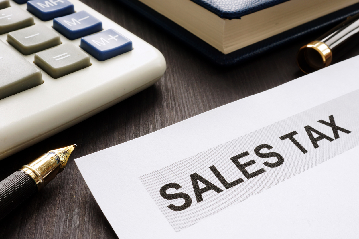 Georgia Sales tax certificate Papers on the office table.