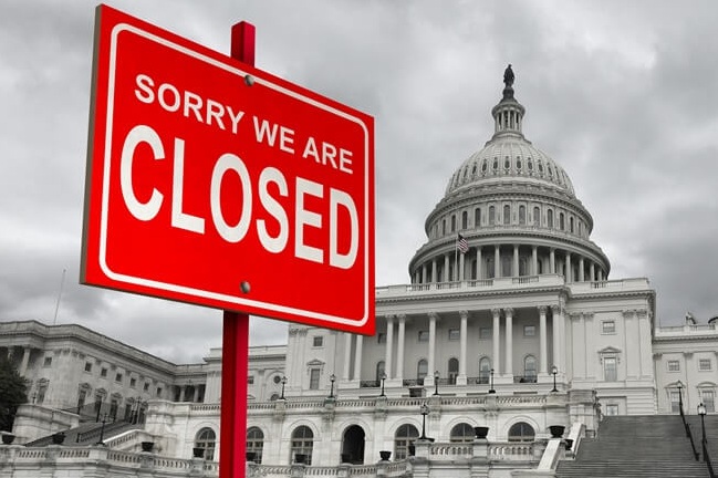 Government with a sorry we're closed sign